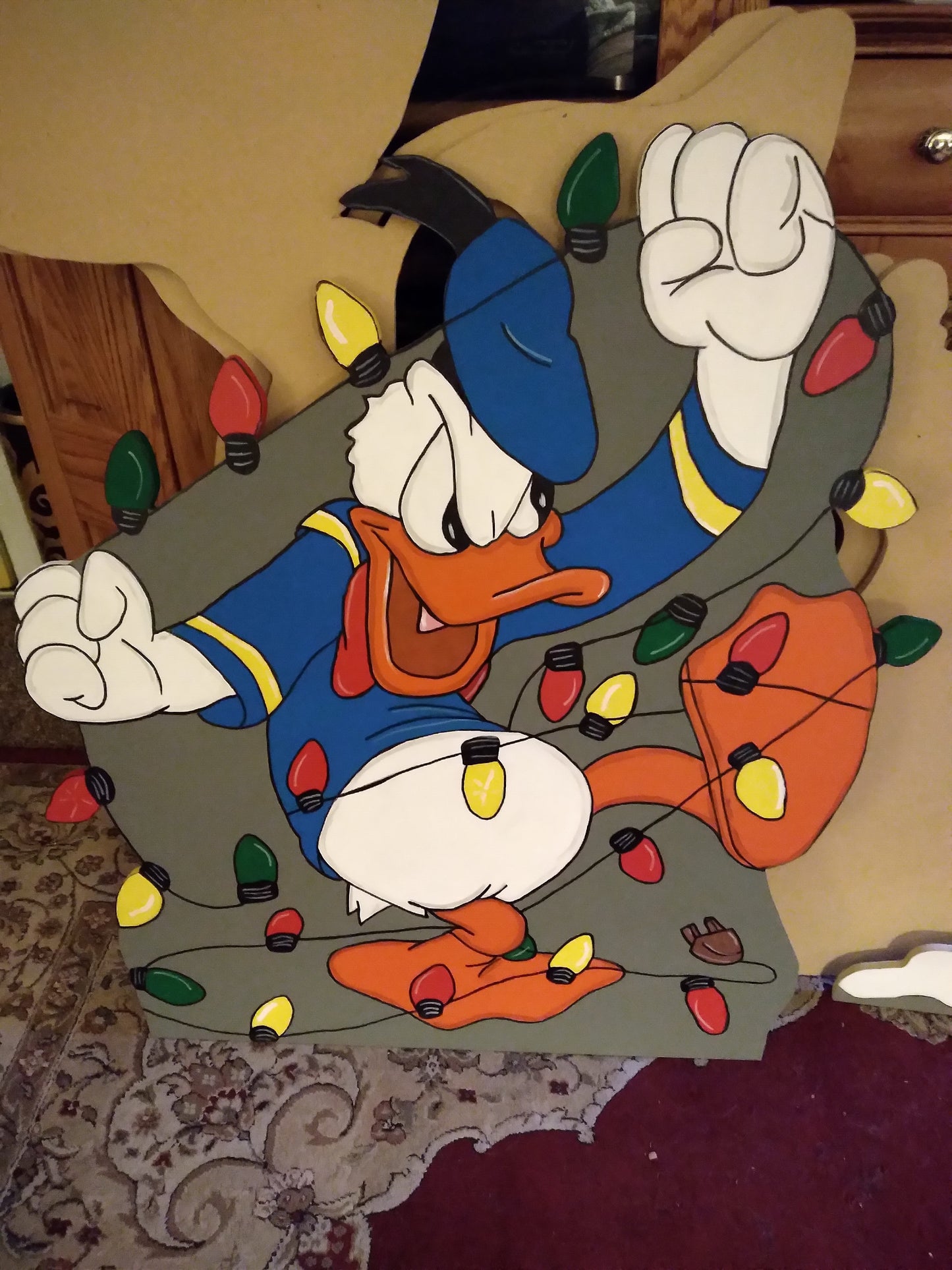 Donald Duck all tangled up in lights