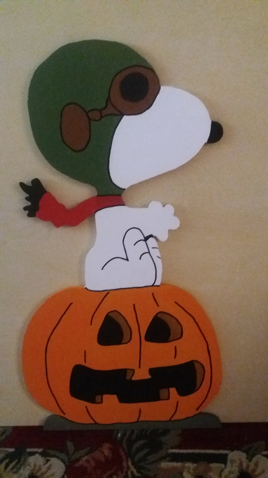 Snoopy red Baron flying on a pumpkin Halloween display