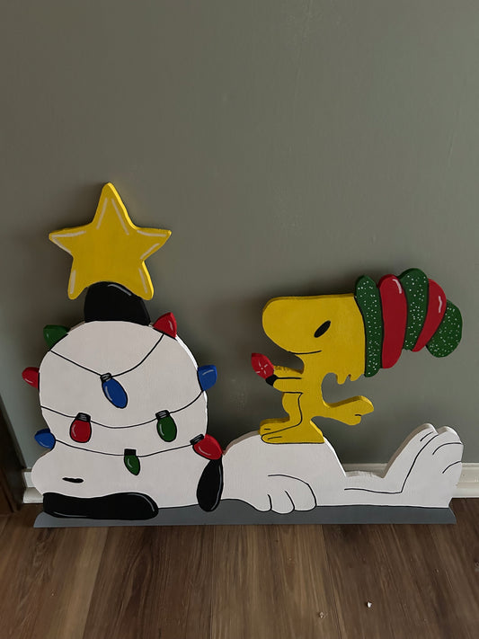 Snoopy and Woodstock tangled in lights