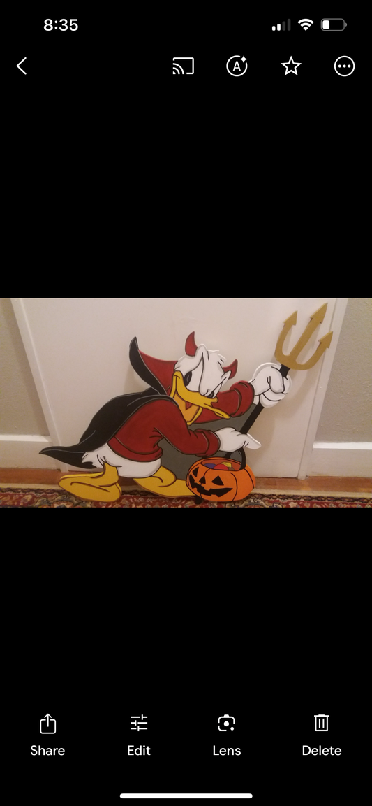 Donald Duck Devil costume Halloween display