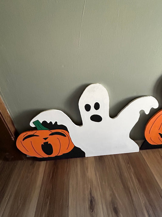 Cute ghost and pumpkin