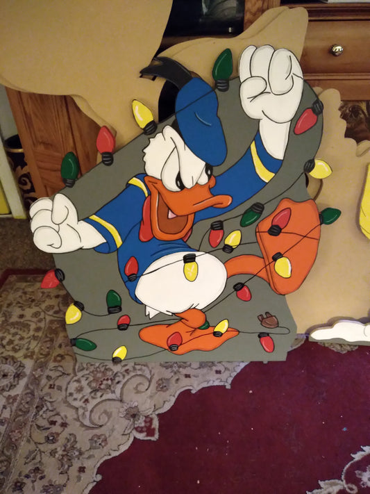 Donald Duck all tangled up in lights